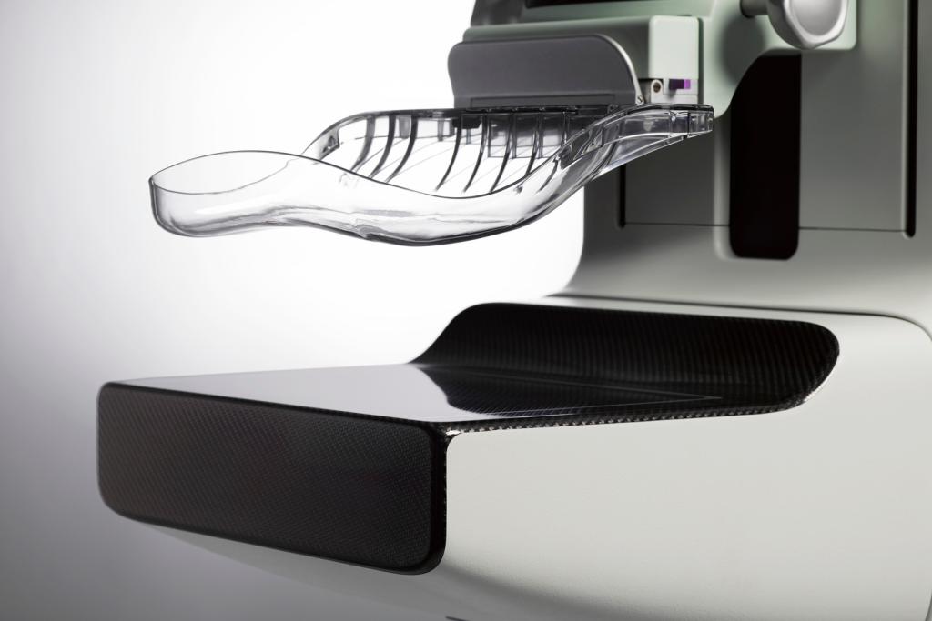 the Hologic Smart Curve breast stabilisation accessory is fitted to a Hologic digital mammography system